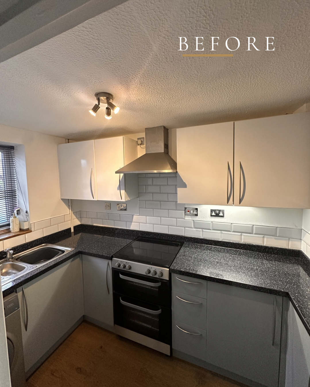 Before — original kitchen with dark countertops